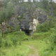 The entrance to Denisova Cave in Sibera.